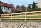 Balkenzaun aus Lärchenholz